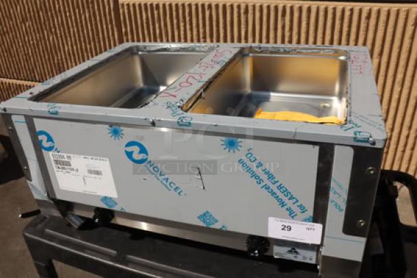 Advance Tabco SW-2E-120 electric hot food table, brand new scratch-n-dent, two pan, undershelf, 120V, silver, with labels.