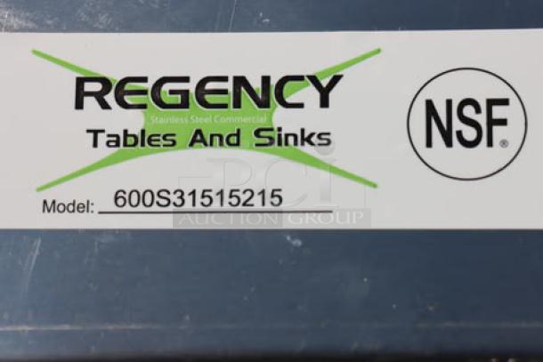 Regency 600S31515215 label on commercial sink, NSF certified, stainless steel, three compartments, minor scratches possible.