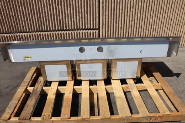 Regency 79" 16-gauge stainless steel three-compartment sink, galvanized legs, 2 drainboards. Minor scratches, factory wrapped. Model 600S31515215.