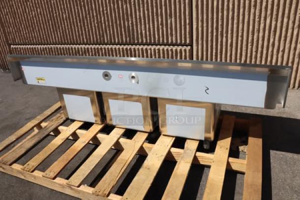 Regency 79" three-compartment stainless steel sink, model 600S31515215, with galvanized legs, drainboards; minor scratches.