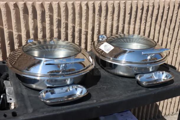 Brand new Acopa Voyage 6 Qt. stainless steel induction chafers with glass top, soft-close lid, model 407IND6CHAF, out of packaging.