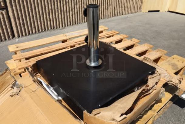 Brand new Lancaster Table & Seating 110 lb. square black granite umbrella base, model 427BASEGRNBK, with minor scratches.