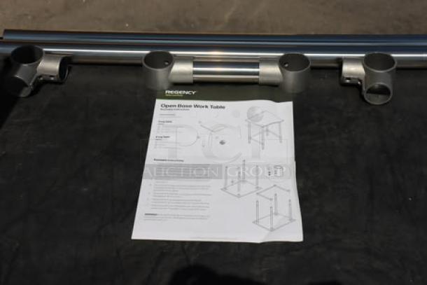 BRAND NEW Regency 600WT12X36BS 36"x12" stainless steel filler table parts shown with assembly instructions. Packaging damaged.