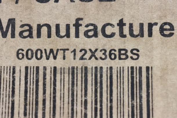 Barcode label showing Regency model 600WT12X36BS. Packaging damaged.