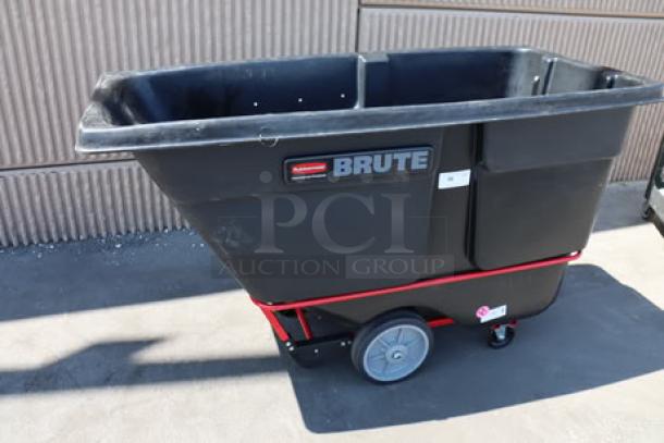 Rubbermaid® BRUTE FG131600BLA black tilt truck, 1.0 cubic yard, 2100 lb. capacity, serial #400011228378, in good condition.