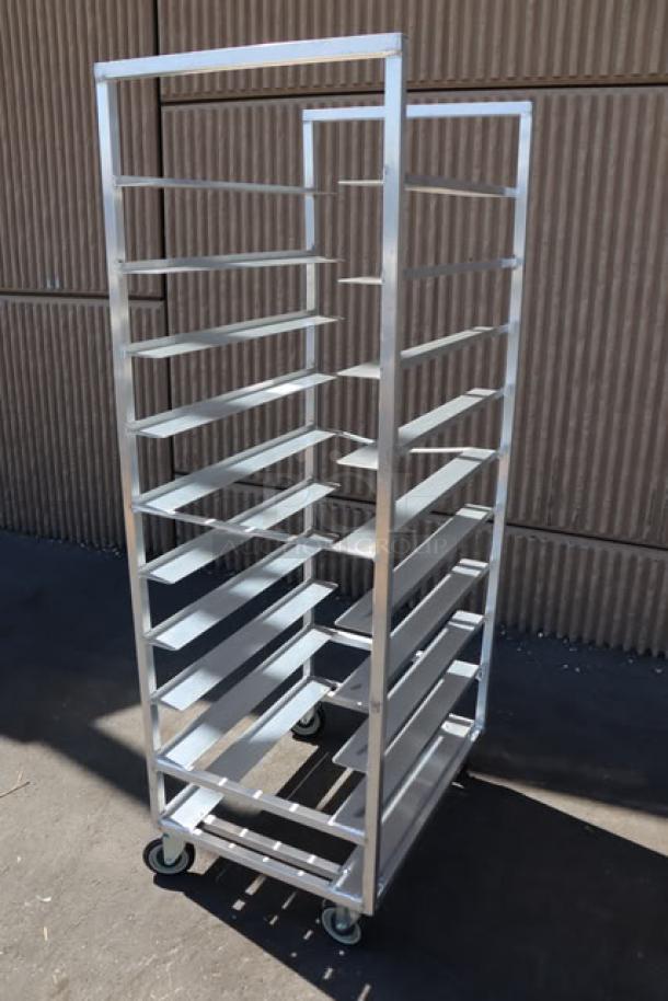 Brand new Channel T448A 20-tray aluminum cafeteria tray rack, bottom load. Bent bar on left side center. Assembled.