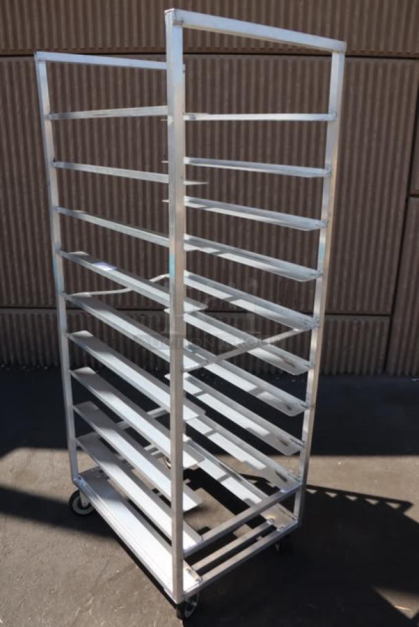 Channel T448A 20 Tray Aluminum Rack, new with a bent left middle bar, bottom load design, on wheels.