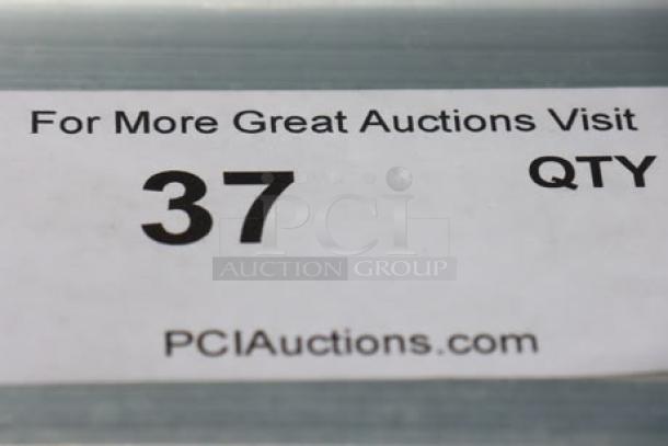 Brand new Channel T448A tray rack, fits 20 trays, aluminum, assembled. Scratch-n-dent: middle bar bent. Auction tag visible.