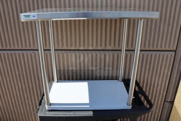 BRAND NEW Regency 600TS2436S 24" x 36" stainless steel work table with undershelf, minor scratches, no original packaging.