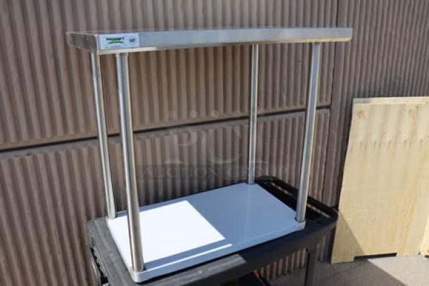 Brand new Regency 600TS2436S stainless steel work table, 24"x36", 16-gauge 304 steel, with undershelf, minor scratches.