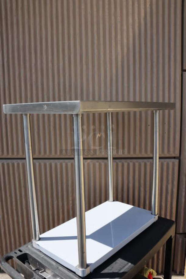 Brand new Regency 600TS2436S 24"x36" stainless steel work table with undershelf, 16-gauge 304 steel, minor scratches.