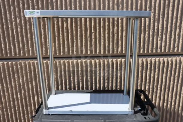 Brand new Regency 18" x 36" 16-gauge 304 stainless steel commercial work table with undershelf, model 600TS1836S.