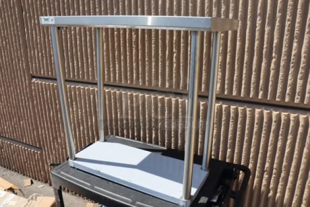 Regency 18" x 36" 16-gauge 304 stainless steel commercial work table with undershelf, brand new, no original packaging.