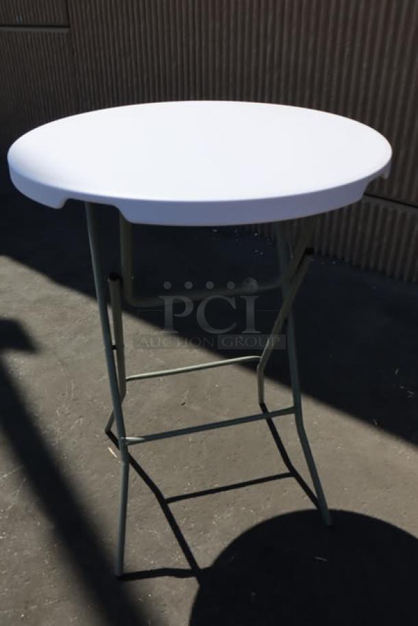 Brand new Lancaster Table & Seating 32" round granite white folding table with sage gray legs, model 384YCZ32RNDB.