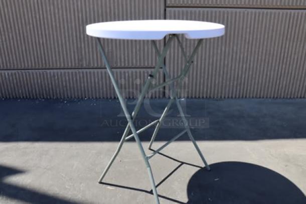 Brand new Lancaster Table & Seating 32" round granite white plastic folding table, bar height, sage gray legs, model 384YCZ32RNDB.