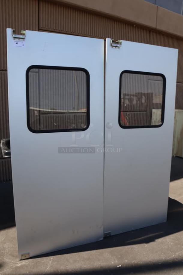 Brand new Curtron Service-Pro Series 30 aluminum swinging traffic doors, 36"x84", with minor scratches, no original packaging.
