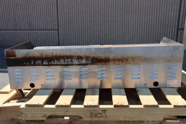 Brand new Avantco EG48N 48" electric griddle with visible surface rust, 208/240V, 10482W-14000W, on wooden pallet.