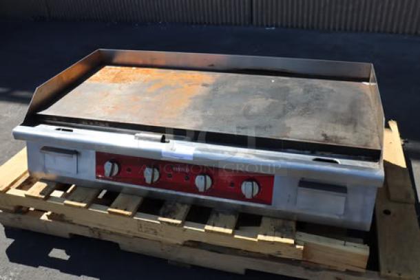 Avantco EG48N 48" electric griddle, 208/240V, 10482W-14000W, brand new scratch-n-dent condition, on a wooden pallet.