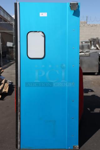 Regency 600TD3684 aluminum traffic door, 36"x84", blue, with 9"x14" window; slight dents, out of original packaging.