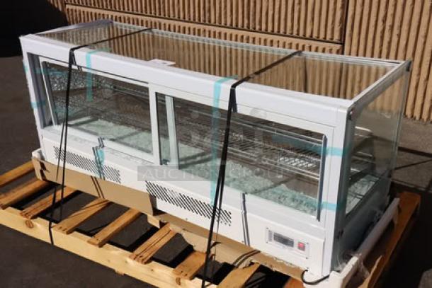 Avantco BCS-60-HC 60" white refrigerated bakery display case, scratch-n-dent with broken glass, ripped power cord, and bent frame.