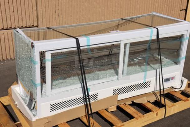 Avantco BCS-60-HC 60" refrigerated bakery display case, white. Features LED lighting. Broken glass, ripped power cord, bent frame.