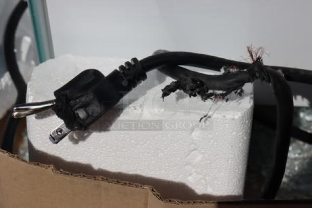 Avantco BCS-60-HC refrigerated display case, damaged. Ripped power cord, broken glass, bent frame. LED lighting, 110V.