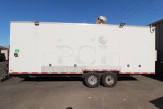 NEW Cruising Kitchens 24' food trailer, white exterior, equipped with security cameras, AC units, LED lights, and propane setup.