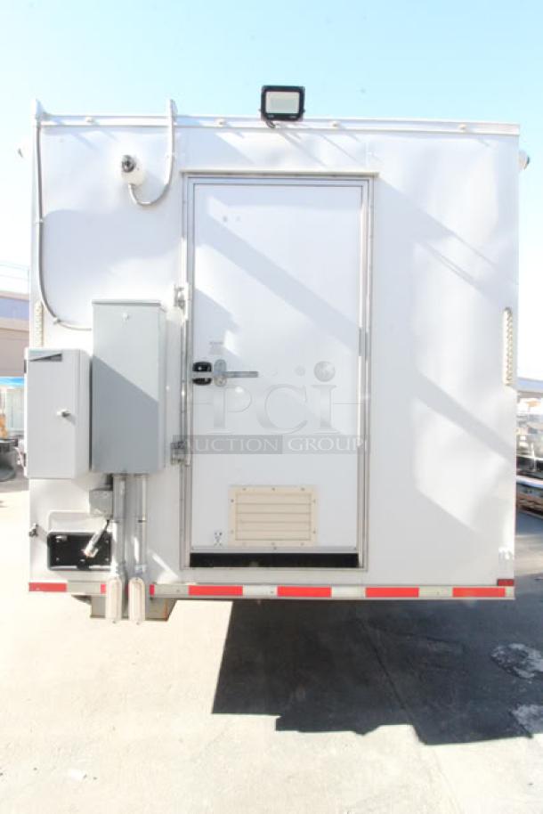 NEW Cruising Kitchens 24' Enterprise Food Trailer, equipped with security cameras, AC units, propane tanks, and LED lights.