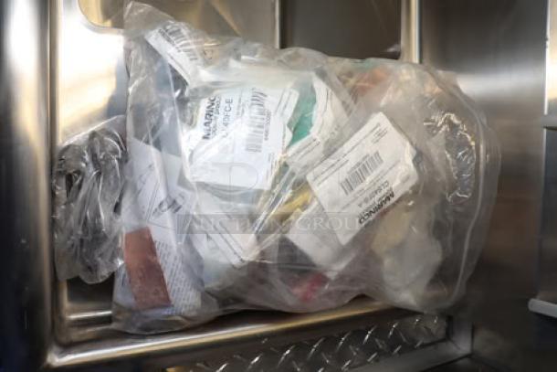 NEW Cruising Kitchens 24' food trailer, stainless interior; features tagged equipment in sealed bag, pristine and unused.