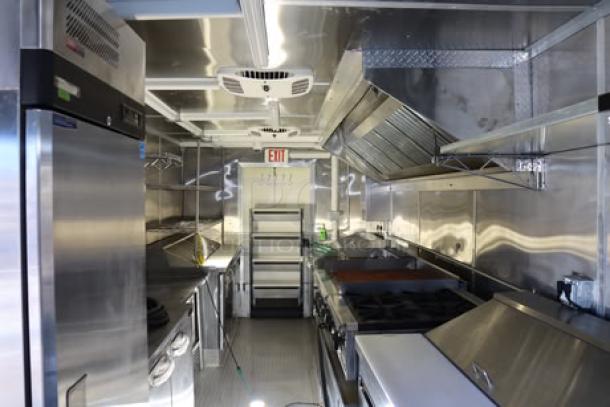NEW Cruising Kitchens 24' food trailer, stainless interior, new top-line equipment, security cameras, rooftop A/C units.