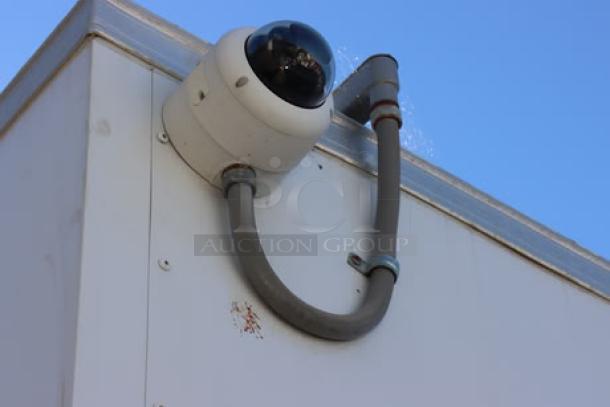 New Cruising Kitchens 24' Enterprise food trailer, white, featuring a visible wireless security camera on exterior.