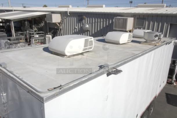 NEW Cruising Kitchens 24' Enterprise food trailer with rooftop A/C units, security cameras, propane tanks, and LED lights.