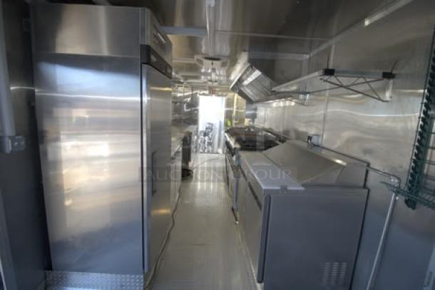 NEW 24' Cruising Kitchens food trailer, stainless steel interior, high-end equipment, security cameras, A/C units, propane setup.