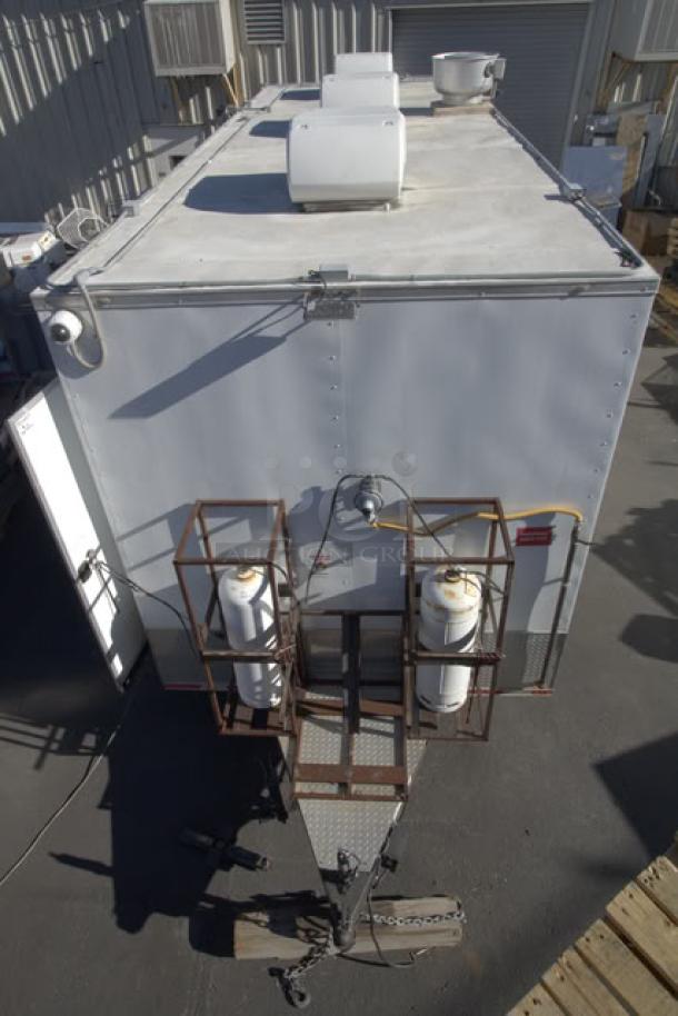 NEW Cruising Kitchens 24' food trailer, rooftop AC units, propane tanks, wireless cameras, LED lights, stainless steel interior.