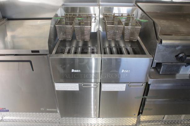 Brand new Cruising Kitchens 24 ft food trailer kitchen. Features Dean deep fryers, commercial griddle, and hood system.