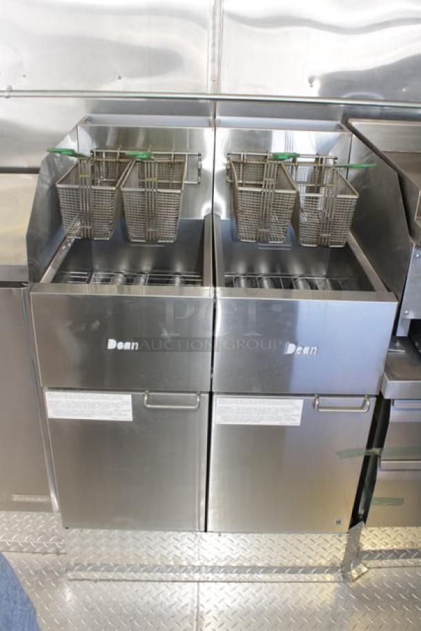 Stainless steel deep fryers with dual baskets, part of a 2023 Cruising Kitchens mobile kitchen trailer, model 1 - EK TRAILER - V12.