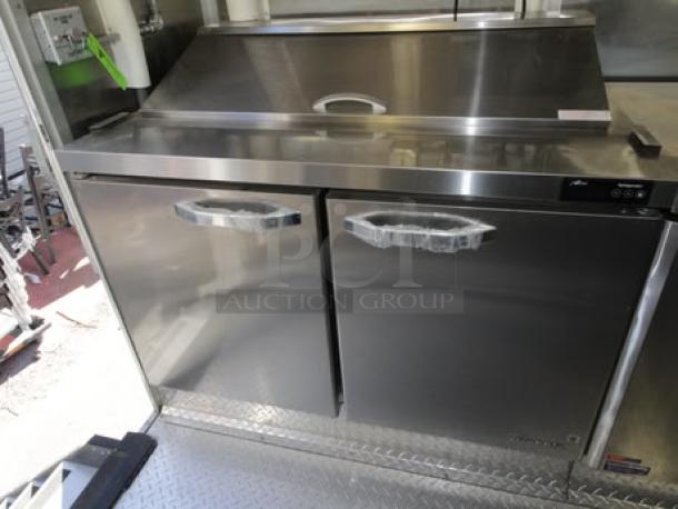 BRAND NEW 2023 Cruising Kitchens 24 Ft. Enterprise Food Trailer featuring commercial-grade stainless steel appliances.