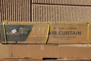 Boltic 48" black aluminum air curtain in box, model 6873512LYB. Features remote magnetic door switch, 120V, new scratch-n-dent condition.