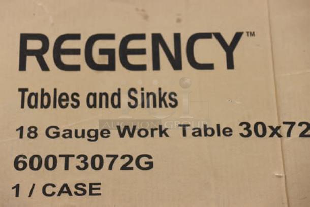 Regency 600T3072G 30"x72" 18-gauge stainless steel work table in original packaging, scratch-n-dent condition.