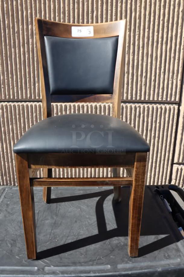 Lancaster Sofia chair, wood vintage finish, black vinyl seat, assembled. May have scratches. Tag with "75" visible.