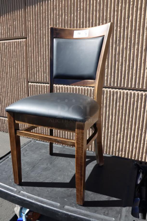 Lancaster Sofia wood chair with vintage finish, black vinyl seat. Assembled, may have scratches. Tag with numbers visible.