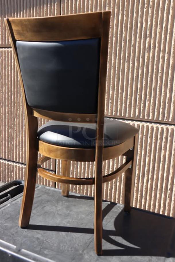 Lancaster Sofia chair with vintage wood finish and black vinyl seat. Assembled, minor scratches possible.