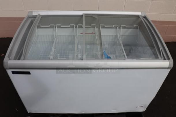 Master-Bilt MSC-49AA 49" curved top display freezer, dented, power cord needs replacement, 115V, 1.5A, 1 phase, S/N: SD0043200112502270044.