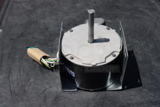 BRAND NEW SCRATCH-N-DENT! Manitowoc Ice 7629413 Fan Motor Magnetek 208-230v. Mounting baracket has a slight bend. - Item #1218942