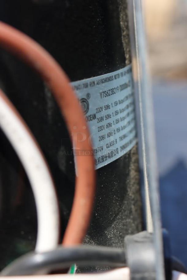 BRAND NEW Manitowoc Ice 7629413 Fan Motor, 208-230v, Magnetek. Slight bend in mounting bracket. Model info visible on label.