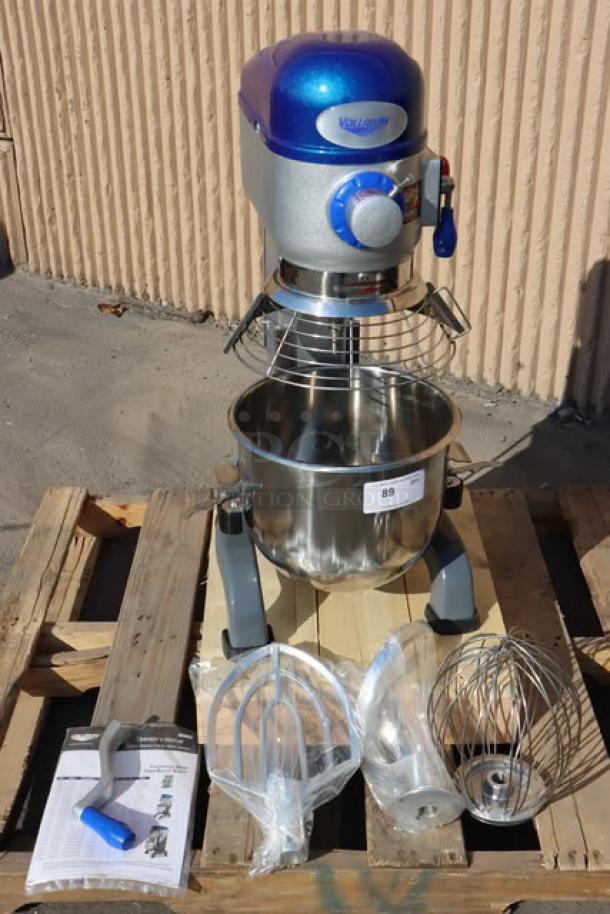 Vollrath 40757 20 Qt. planetary stand mixer, brand new, with guard, standard accessories, and visible serial number tag.