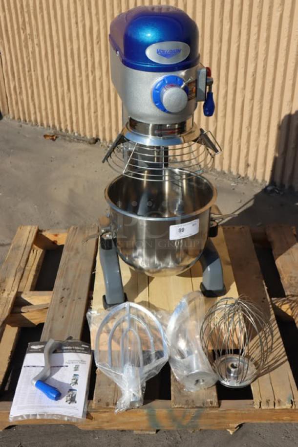 Brand new Vollrath 40757 20 Qt. planetary stand mixer, with guard, standard accessories, and manual. Minor scratches visible.