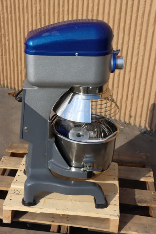 Brand new Vollrath 40757 20 Qt. planetary stand mixer with guard, standard accessories, 1/2 hp, 110-120V, minor dents.