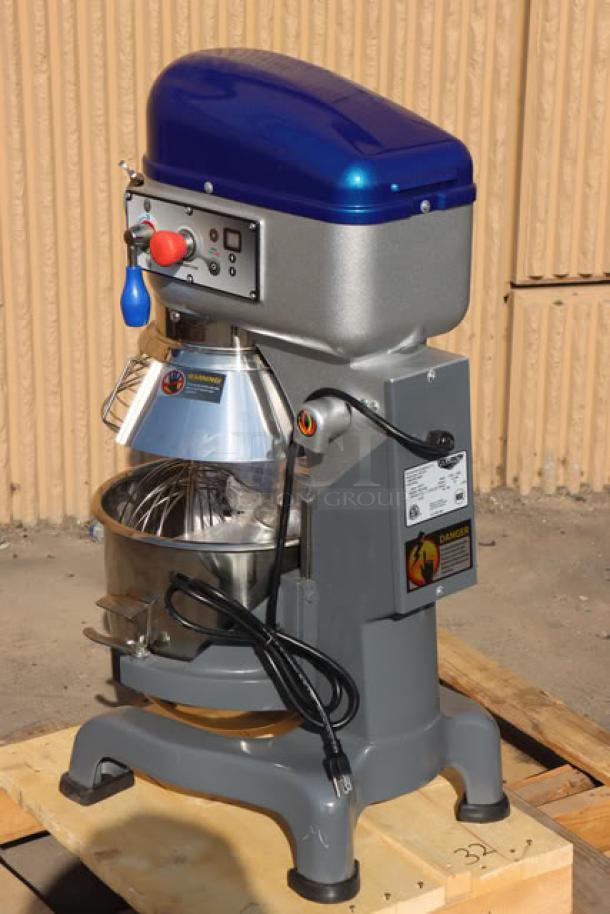 BRAND NEW Vollrath 40757 20 Qt. Planetary Stand Mixer, scratch-n-dent condition, with guard, standard accessories, and visible labels.