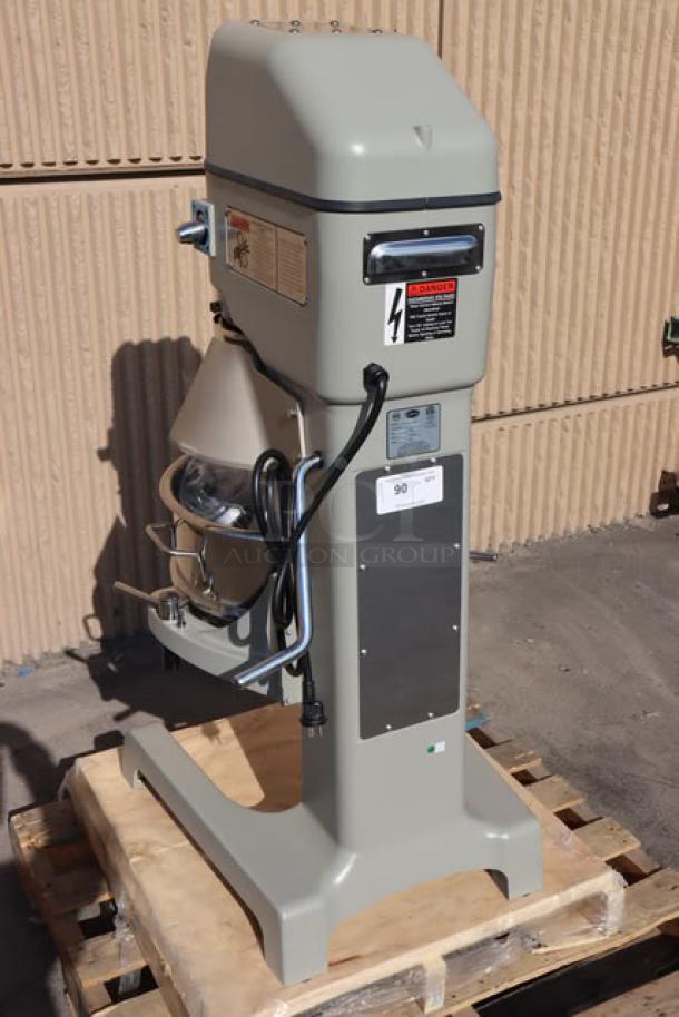 Brand new Globe SP30P 30 Qt. Planetary Pizza Mixer with guard, minor scratches, 1 1/2 hp, 240V, 12 Amps, model label visible.